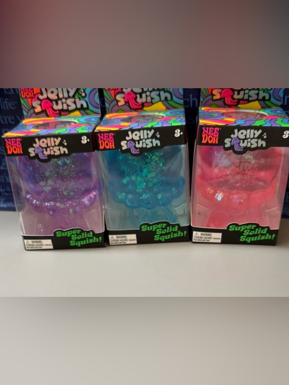 Jelly Squish Super Solid Squish Toy - Pink, Blue, Purple